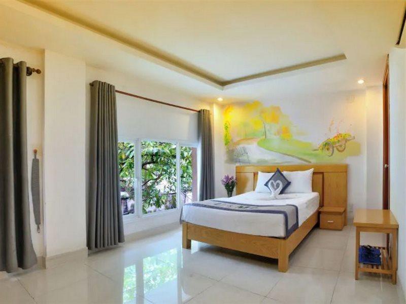 U And Me Hotel Tan Phong Esterno foto